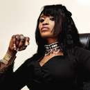 Powerful African-Queen Shemale Dominatrix in Red Deer