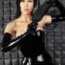 Tall Amazonian Dominatrix in Red Deer